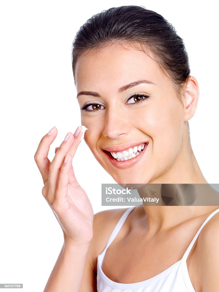 Mulher sorridente aplicar Hidratante Creme - Royalty-free 20-29 Anos Foto de stock