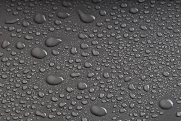 istock water droplets of various shapes on a black surface 1601380872