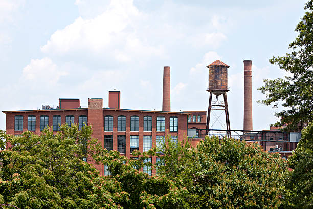 istock Vintage factory, water tower and smoke stack 160138410