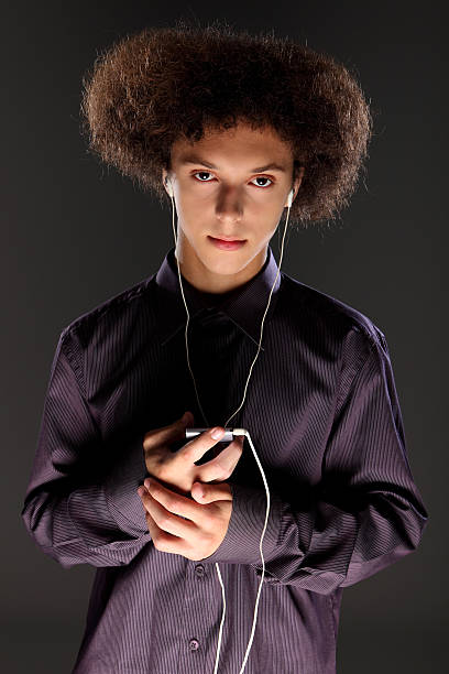 Big Bushy Afro Hair Teenager Listening To Music Stock Photo - Download  Image Now - Adult, Afro Hairstyle, Beautiful People - iStock