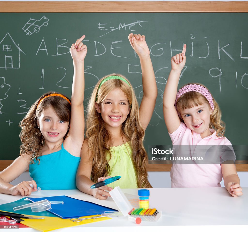 clever kids student group at school classroom smart group of student kids at school classroom raising hand 4-5 Years Stock Photo