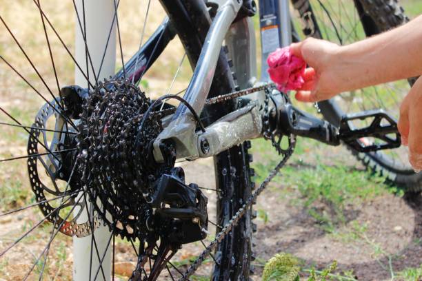 istock Man cleaning a bike 1601394462