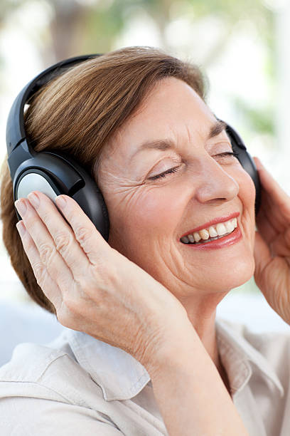 istock Senior listening to music 160141419