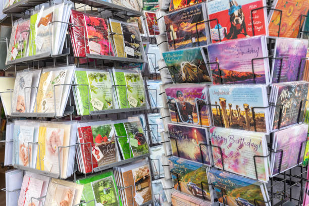 Traben Trarbach, Germany - August 8th 2023: Wish cards in a row in a shopping street in Germany.