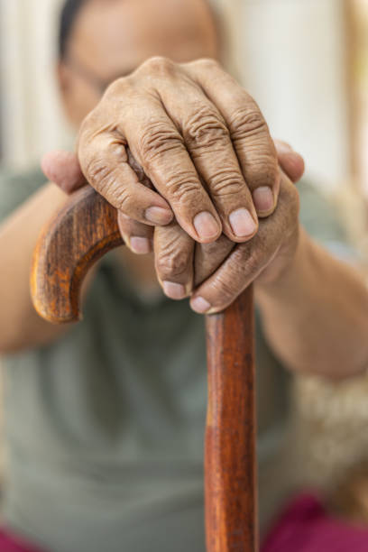 istock Cropped shot of an unrecognizable man leaning on his walking stick 1601421269