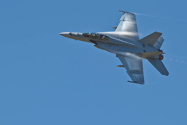 top gun F/A-18 Super Hornet in flight supersonic airplane photos stock pictures, royalty-free photos & images