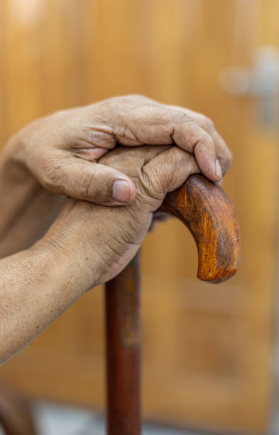 istock Cropped shot of an unrecognizable man leaning on his walking stick 1601423976