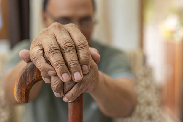 istock Cropped shot of an unrecognizable man leaning on his walking stick 1601429401