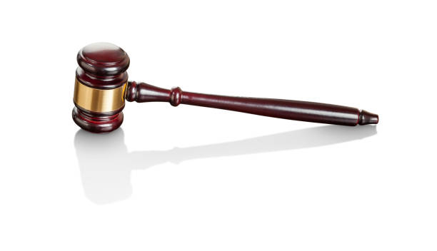 istock Lustrous Wooden Gavel on White Background. 1601429440