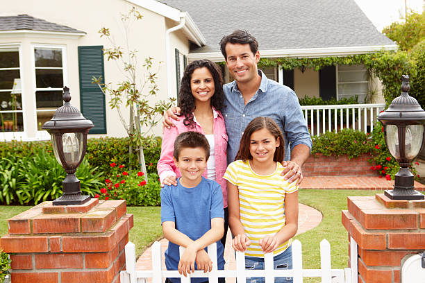 istock Hispanic family outside home 160143496