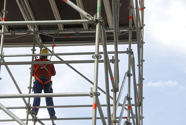 scaffold and worker stock photo