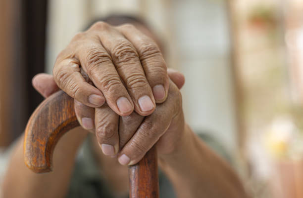 istock Cropped shot of an unrecognizable man leaning on his walking stick 1601437304