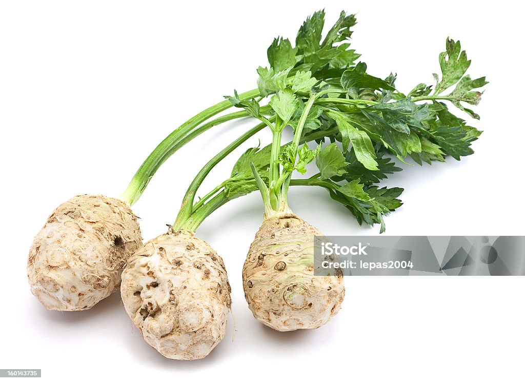 Fresh celery with root Fresh celery with root leaf on white background Celery Stock Photo