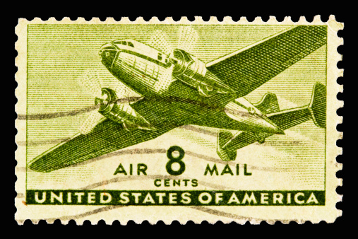 A 1944 issued 8 cent United States airmail postage stamp showing Transport Plane.
