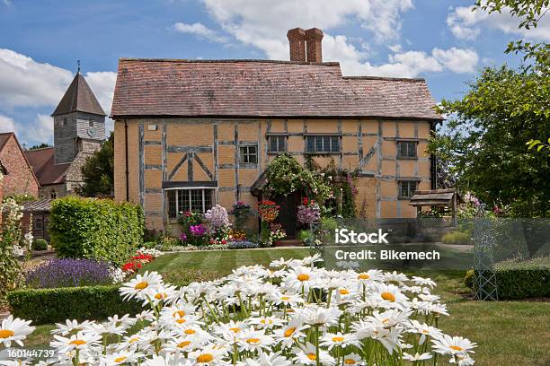 Village Cottage Stock Photo - Download Image Now - Church, Cottage, Detached House