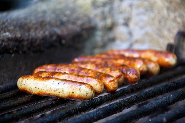 Sausages on the grill stock photo