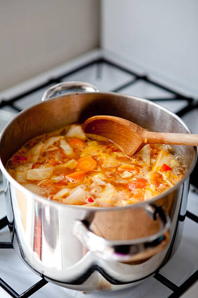 istock Vegetable Soup Cooking On Stove 160145234