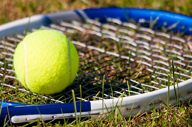 istock Tennis Ball and Racquet 160145481