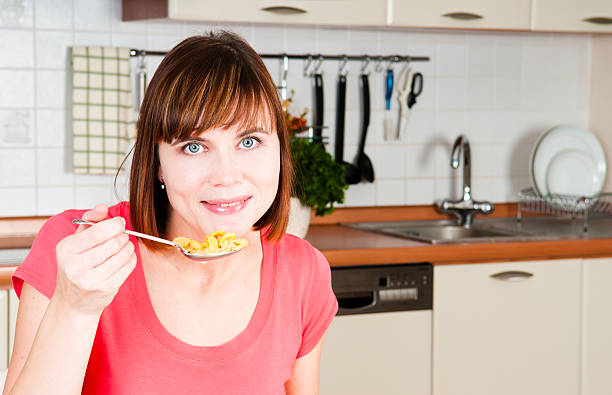 istock Beautiful woman having a healthy breakfast 160146402