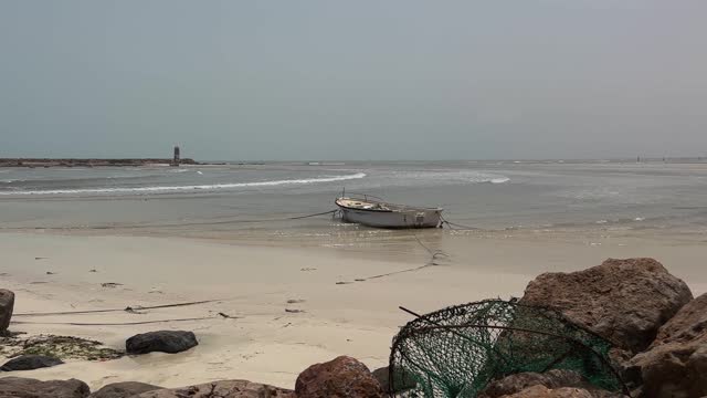 Fishing boat on beach of Djerba in Tunisia