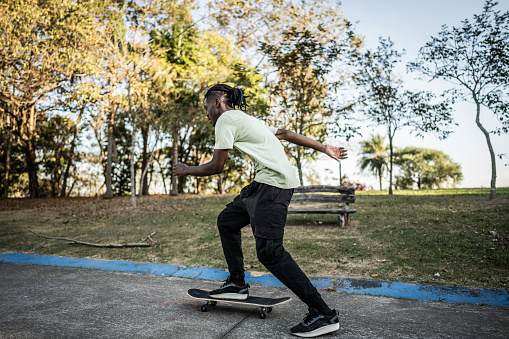 Young man skating at the park