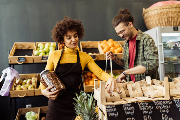 istock Man shopping grocery in the small store 1601518564