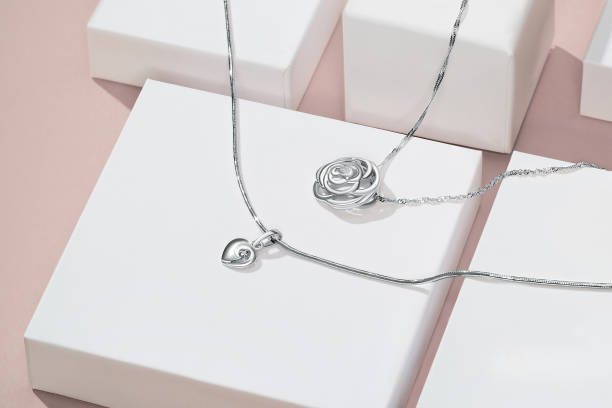 Elegant jewelry set. Jewellery set with gemstones. Jewelry accessories collage. Product still life concept. Ring, necklace and earrings. stock photo