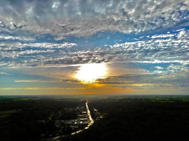 Arial shot of the sun rising over the Edward river in the small rural town of Deniliquin NSW Australia