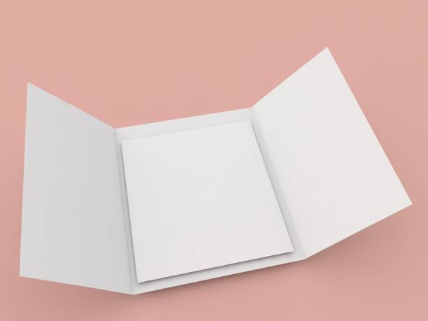istock Blank trifold brochure mockup A4 on orange background. 1601626181