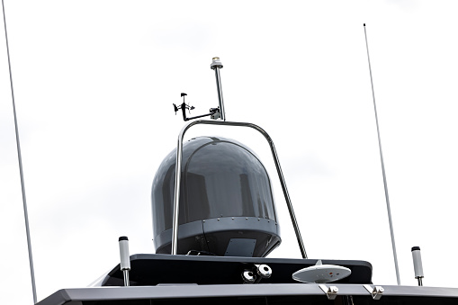 Yacht navigation equipment satellite radar, antenna, technical support, wireless transmission, background with copy space, full frame horizontal composition