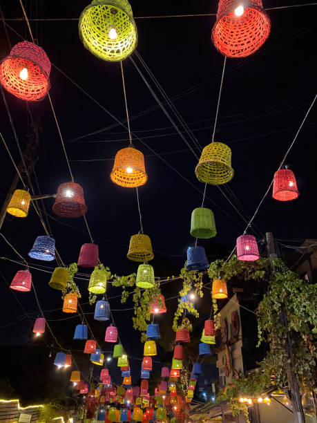 istock Illuminated Rainbow Street by night 1601739408