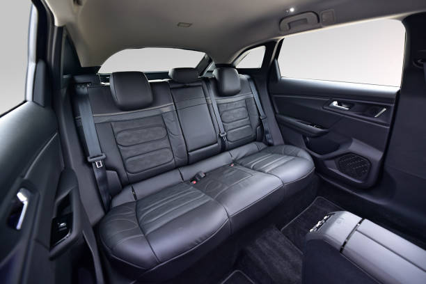 istock Rear seats covered with fabric in a luxury car 1601773656