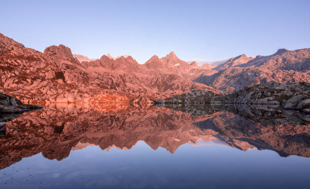 istock A mountain landscape reflected into the lake at sunrise 1601782456