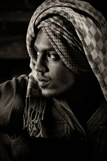 Black and white portrait young man wearing turban. You might also be interested in these: