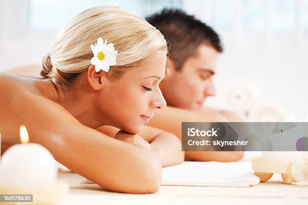 Young Couple Enjoying Themselves At The Spa Centre Stock Photo - Download Image Now - Adult, Adults Only, Alternative Medicine