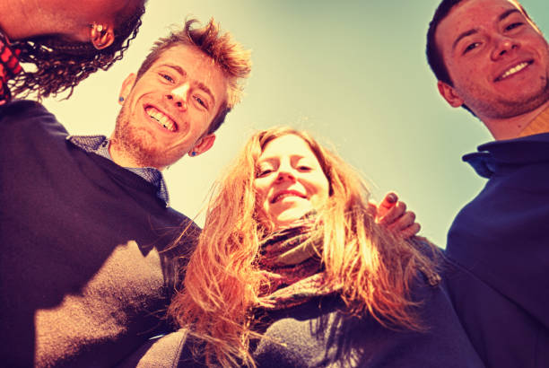 istock Huddling friends in circle 160178755