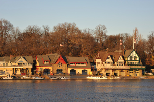 Row of boathouses at sunset, Philadelphia, Pennsylvania, USA