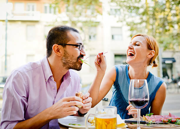 istock Happy Beautiful couple having lunch in outdoors cafe 160179593