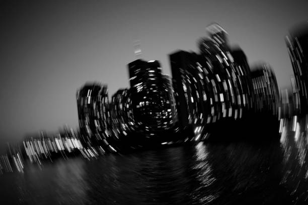 TORONTO AT NIGHT FROM LAKE ONTARIO, IN MOTION BLUR