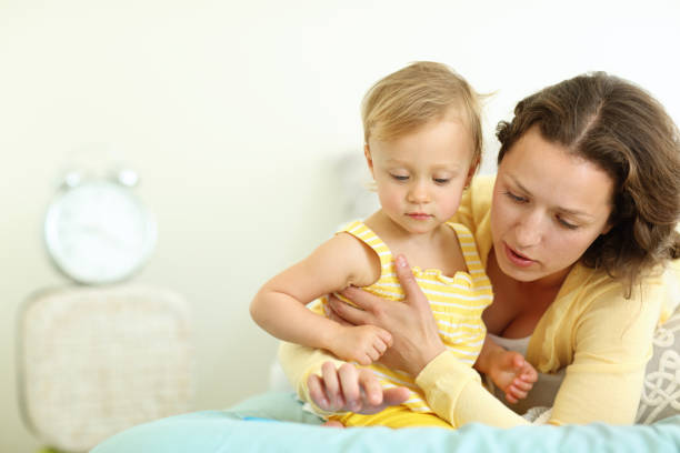 istock Mother and child playing with tablet 160186363