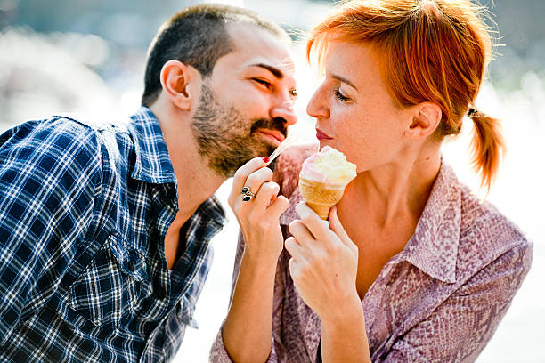 istock Happy Beautiful couple Eating Ice-Cream 160187249