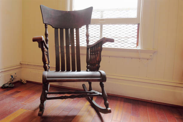 Old rocking chair isolated on white background.