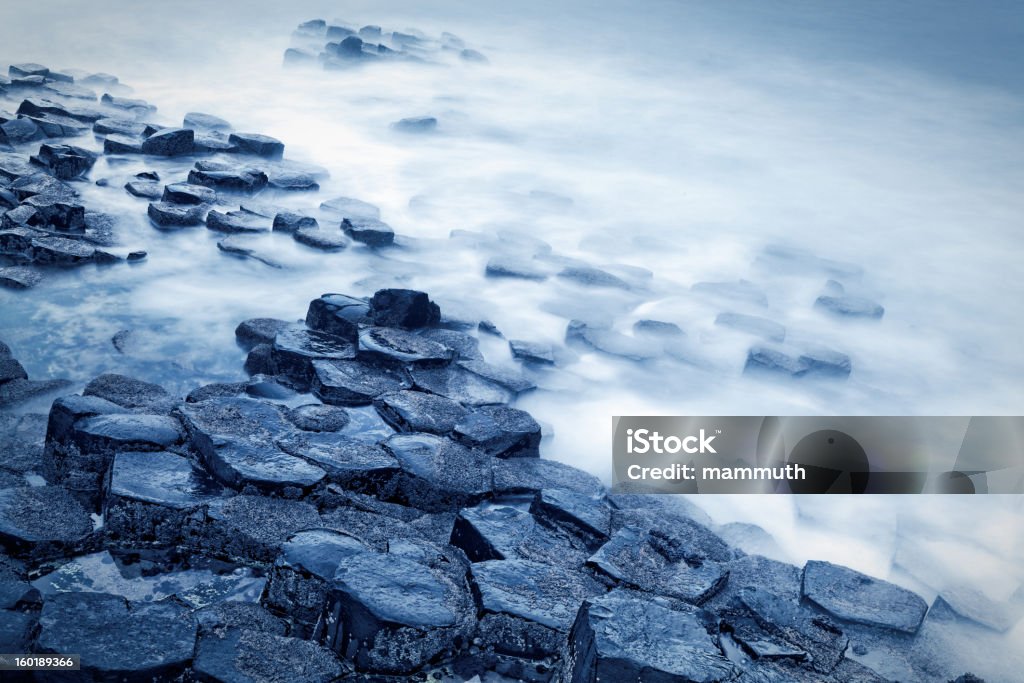 Giant's Causeway long exposure shot the basalt columns of the Giant's Causeway - long exposure shot - County Antrim, Northern Ireland. Giants Causeway Stock Photo