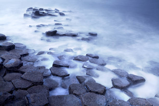 the basalt columns of the Giant's Causeway - long exposure shot - County Antrim, Northern Ireland.