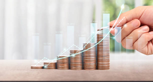 istock Coin with trading graph financial investment concept 1601895103