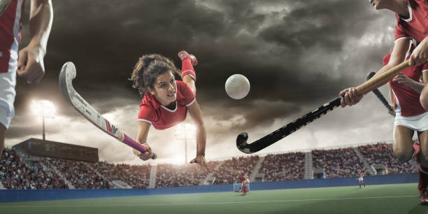 istock Field Hockey Player Diving to Hit Ball 160189839
