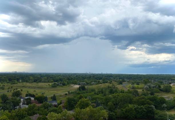 istock Storm Clouds over city - Mesmerizing Wide Angle Horizon 1601946177