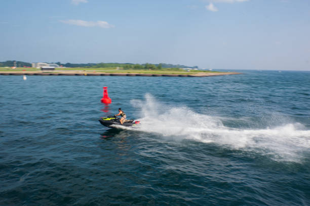 Personal Watercraft - Riding through Lake Ontario stock photo