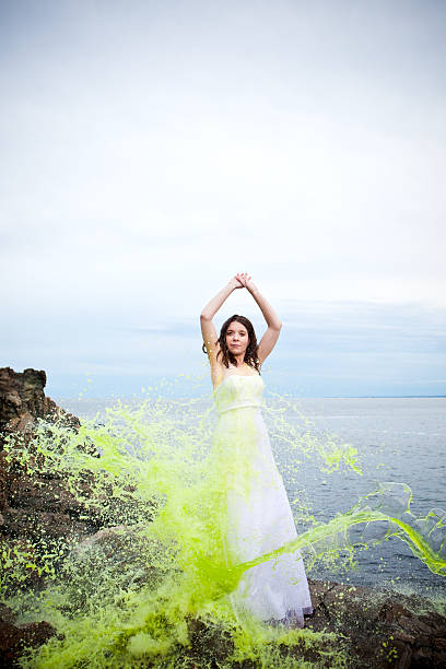 istock Trash-the-wedding dress with green paint 160194814