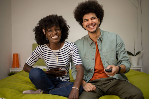 istock Young couple watching TV 1601971856